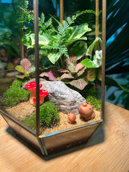 Mini Garden with Cow and Mushroom: Indoor Plant Arrangement in Golden Frame Polygonal Terrarium Glass